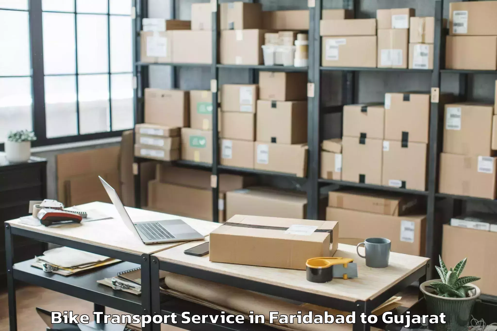 Professional Faridabad to Kamrej Bike Transport